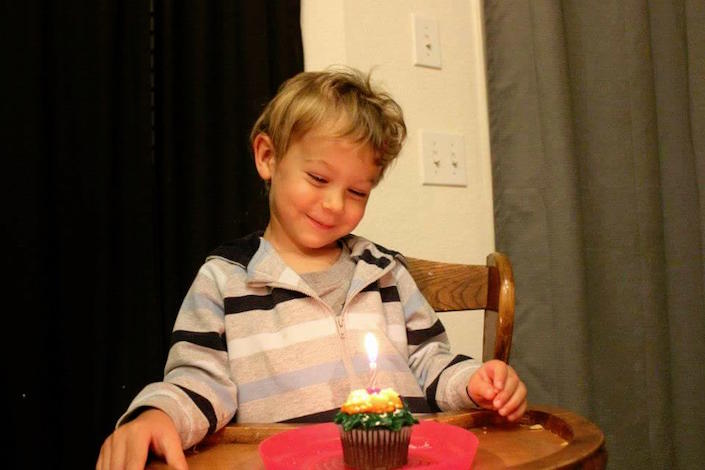 Boy with cupcake