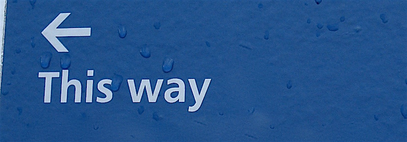Sign with arrow: "This way"