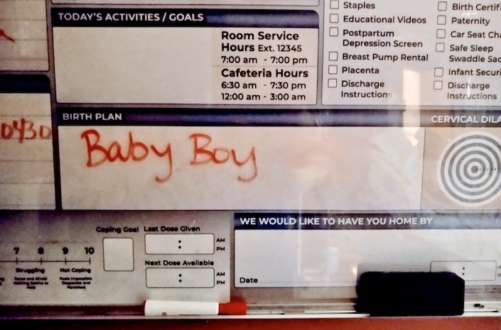Birth plan board: "Baby boy!" written in 